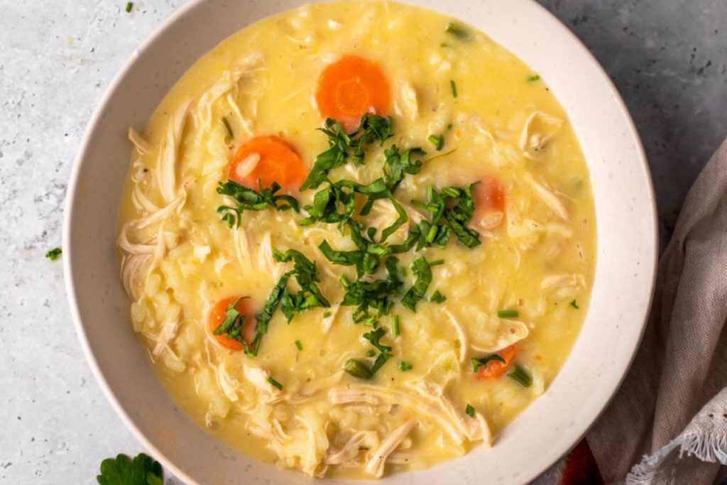 Avgolemono soup in a bowl.