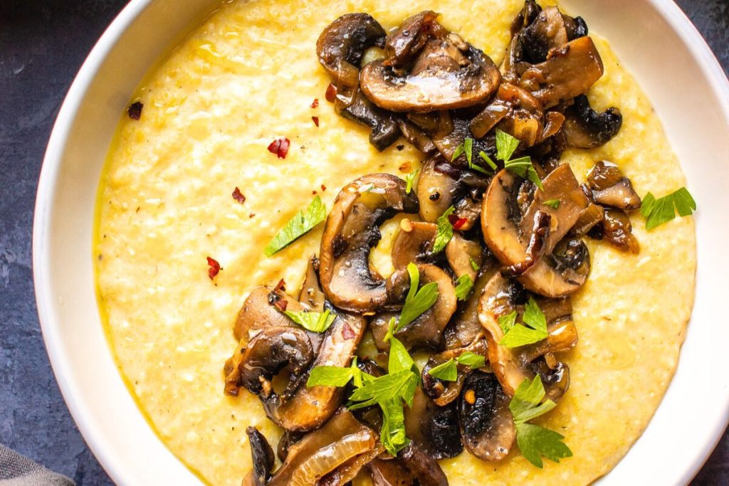 Creamy polenta in a white bowl.