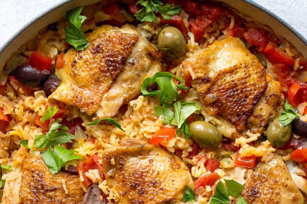 Spanish chicken and rice in a pan.